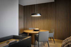 Dining area with light wood-style flooring