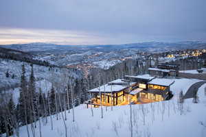 Snowy aerial view with a mountain view