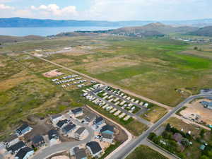 View of property location featuring a water and mountain view