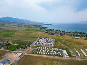 Aerial overview of property's location with a water and mountain view
