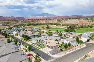 Aerial view of residential area featuring mountains