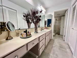 Master Bathroom vanity area with lots of closet space