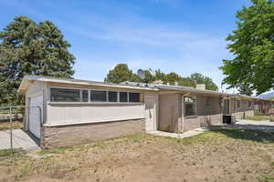 View of front of property with central AC