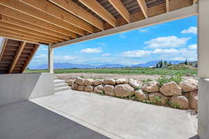 View of patio with a mountain view
