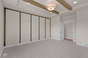 Basement with light carpet, recessed lighting, and baseboards
