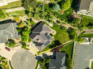 Aerial perspective of suburban area with property parcel outlined