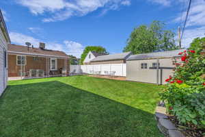 View of yard with a patio