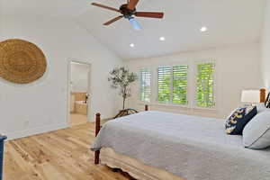 Primary bedroom, hardwood floors, ceiling fan and en-suite bathroom
