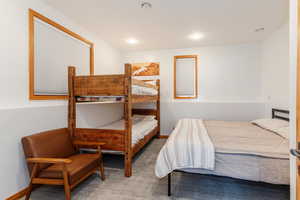 Bedroom with carpet floors and recessed lighting