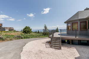 View of yard with a deck