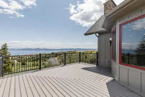 Wooden terrace with a water and mountain view