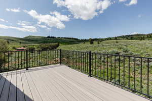 Deck featuring a view of rural / pastoral area
