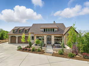 View of front of home with concrete driveway