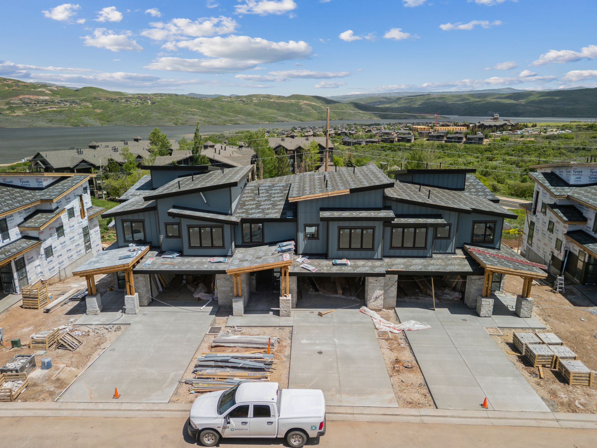 View from above of property with a mountain backdrop