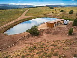 Drone / aerial view of a water and mountain view