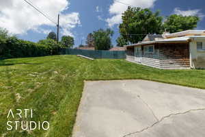View of yard with a patio