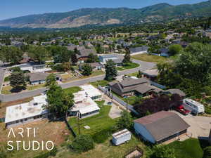 Aerial view of residential area with a mountain backdrop