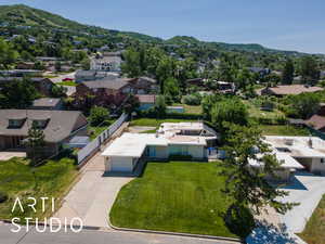 Aerial view of residential area with a mountain backdrop
