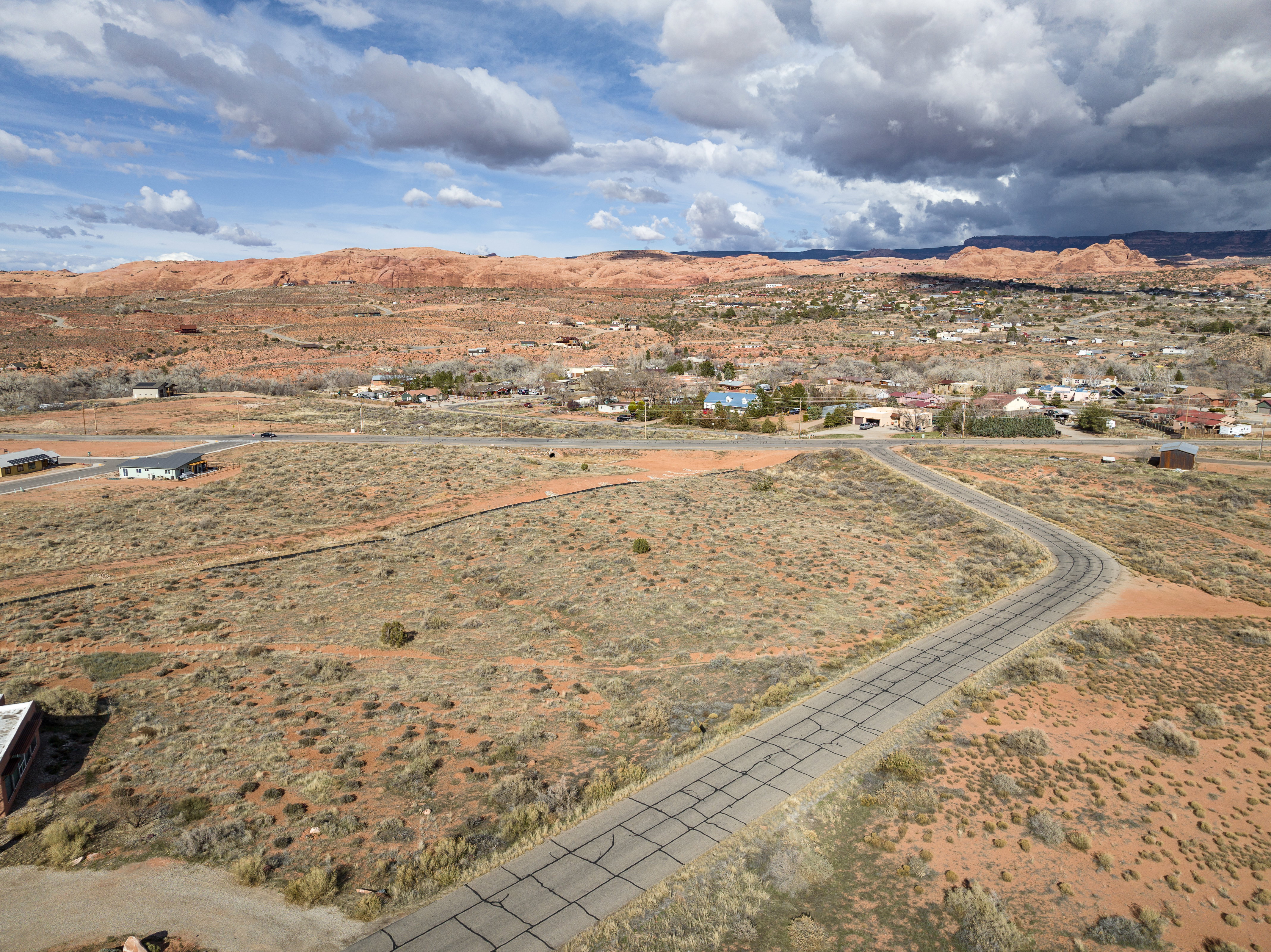 Overview of rural landscape with a mountain backdrop and a desert landscape