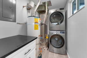 Laundry room features an extra cabinet and countertop for folding.