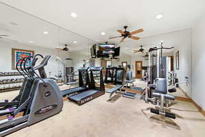 Exercise room with recessed lighting and ceiling fan