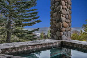 Swimming pool with a hot tub