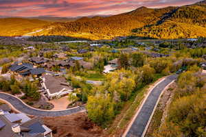 Aerial view at dusk of a mountain view and a residential view