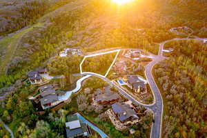 View of property location featuring a heavily wooded area