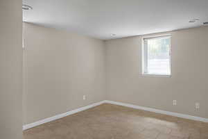 Empty room with baseboards