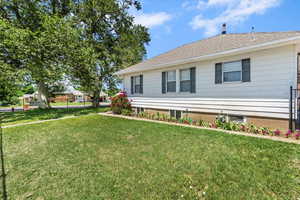 Fenced yard with shade trees. New roof 2020