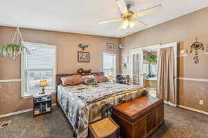 Bedroom with carpet, baseboards, ceiling fan, french doors, and access to exterior