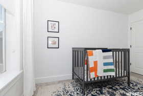 Unfurnished bedroom featuring baseboards