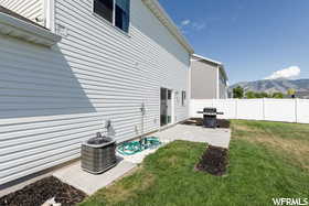 View of yard featuring a mountain view and a patio area