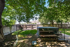 View of fenced backyard