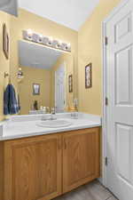 Bathroom with vanity and tile patterned floors