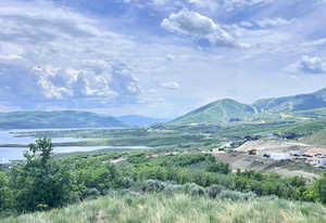 Mountain view featuring a large body of water