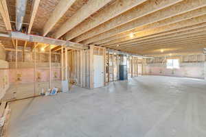Below grade area featuring heating unit