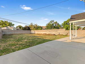 View of yard with a patio