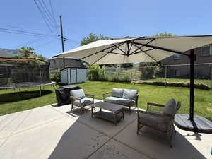 View of patio / terrace featuring a trampoline and an outdoor living space