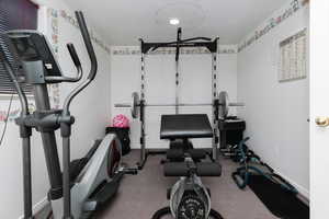 Workout room with baseboards