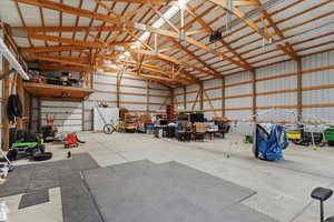 Garage with metal wall and a garage door opener