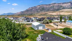 View of mountain background featuring nearby suburban area