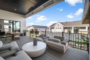 Wooden deck with a residential view