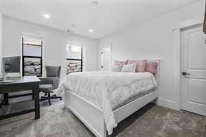 Bedroom featuring carpet floors, recessed lighting, and a desk
