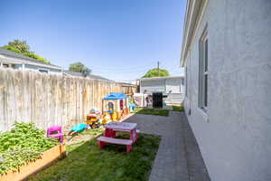 View of yard with a patio