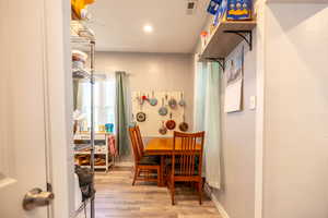 Dining area featuring wood finished floors