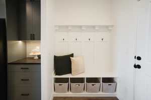 Mudroom featuring wood finished floors