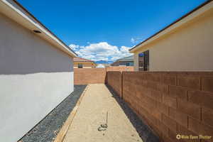 View of fenced backyard