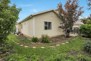 View of property exterior featuring a patio