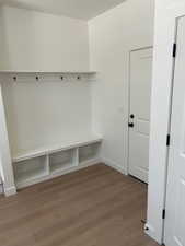 Mudroom with wood finished floors